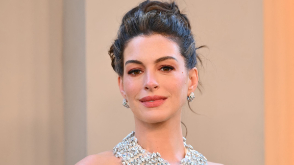 Anne Hathaway’s Matchy-Matchy Red Lips and Nails Are Fall’s Most Glamorous Trend—See the Photos
